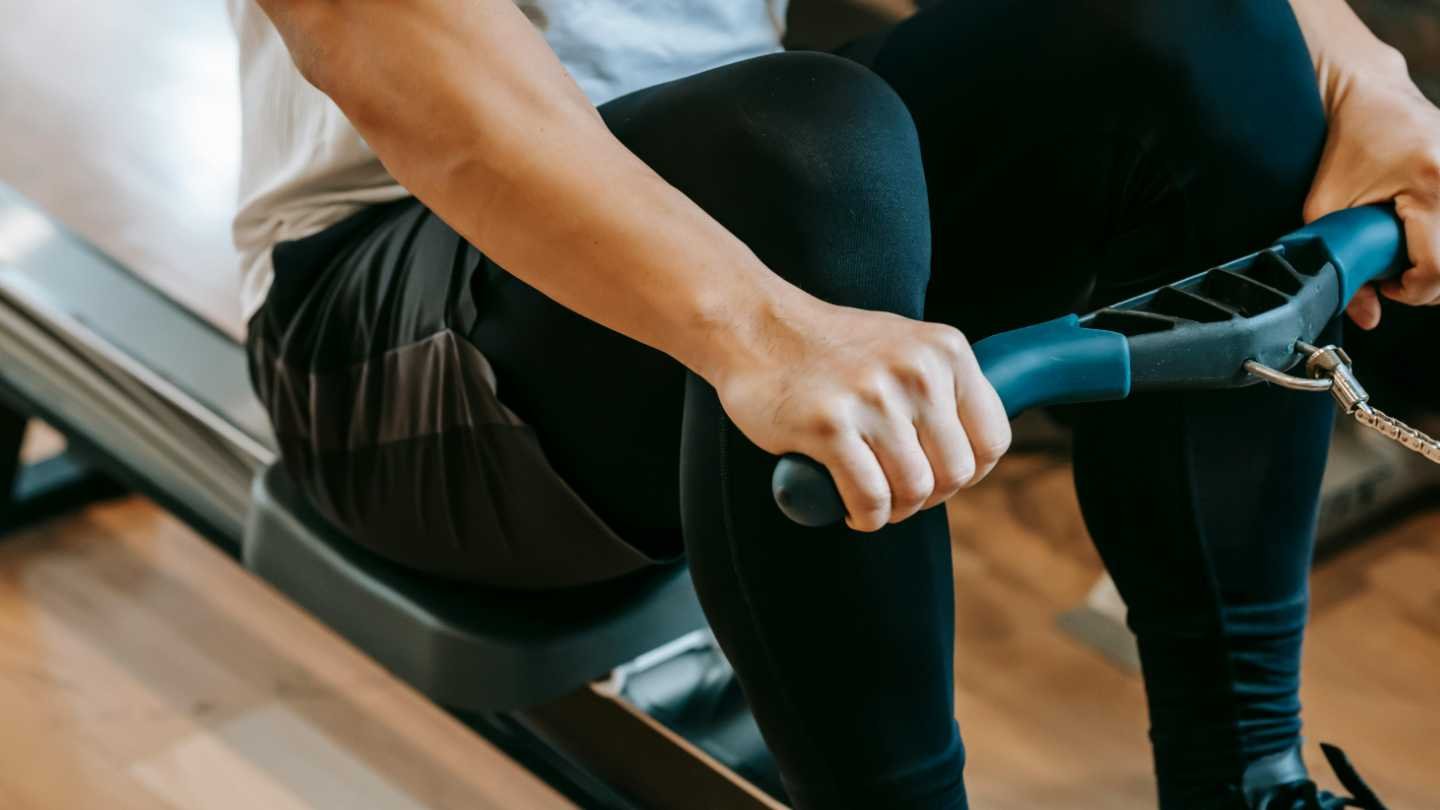 Man on Rowing Machine
